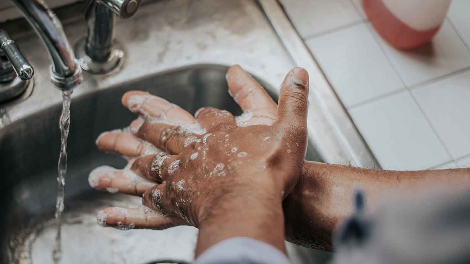 man washing hands
